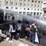 Ittalian police clash with Ethiopian and Ertrian migrants